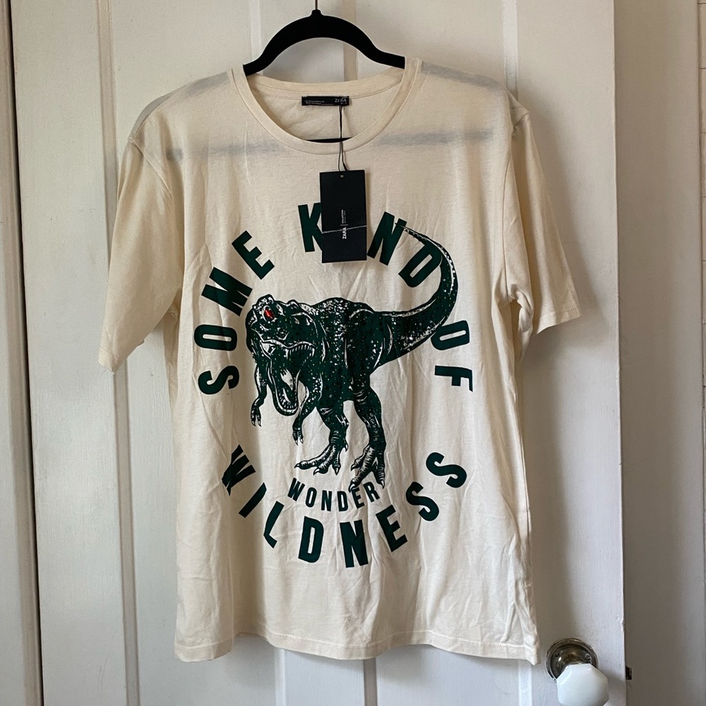 funky cream colored graphic bedazzled tee